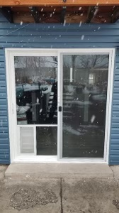 Sliding door with snowy background.