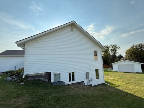 White house with grassy yard