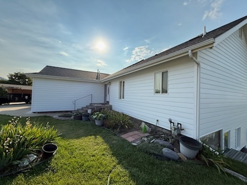 White house with garden and sunlight