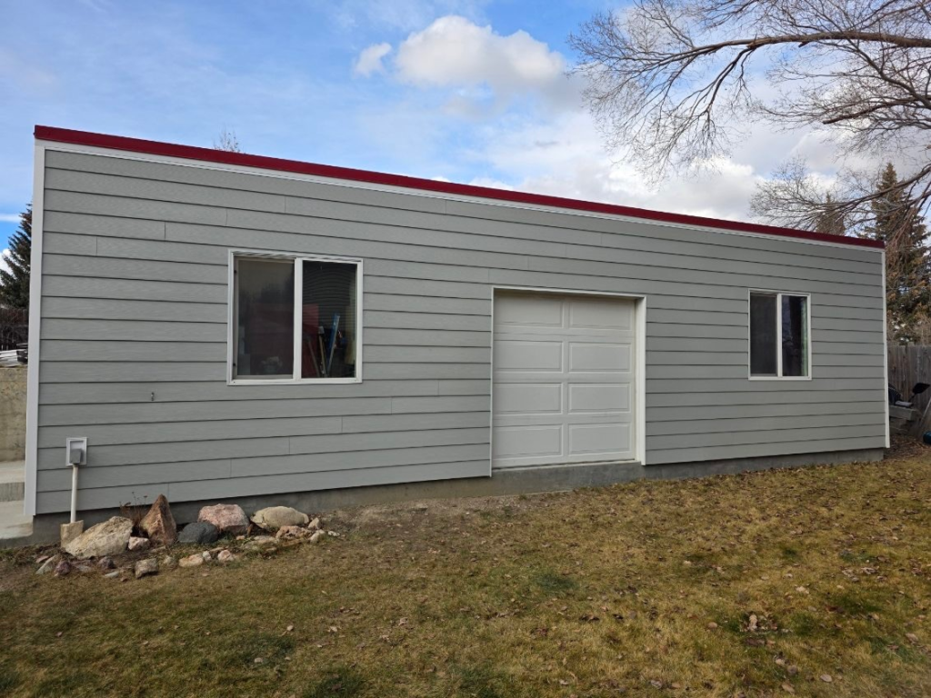 Gray house with red roof